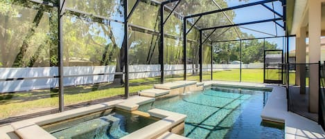 Screened back yard with Pool and Spa