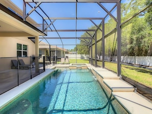 Screened back yard with  Pool and Spa