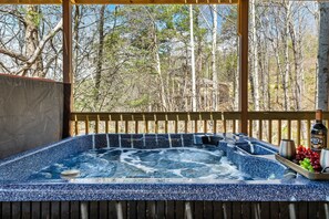 Soak in the hot tub on lower deck 