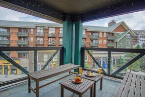 This beautiful balcony has a view of the village!