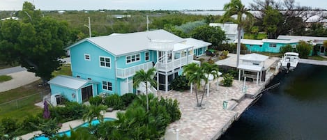 Canal home with pool.