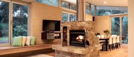 Free standing stone fireplace to keep warm and cosy during the cold winter evenings