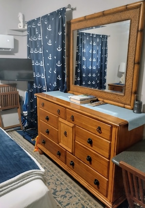 large dresser with plenty of space for clothes