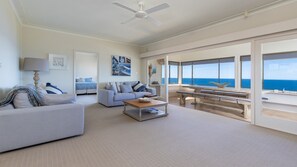 Living and dining room with ocean views