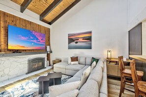 Movie and game night will last well into the night on the big screen above the fireplace