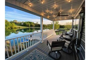 Party lights on huge deck.  Breathtaking private pond