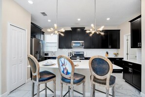 Frontal view of kitchen and bar area