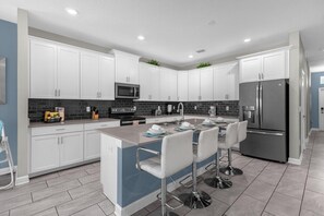 View of kitchen bar and seating