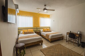 Comfortable Suite with 2 Double beds,  SmartTV, Desk & Chair & Air Conditioning