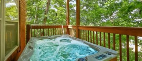 Enjoy relaxing in the hot tub.