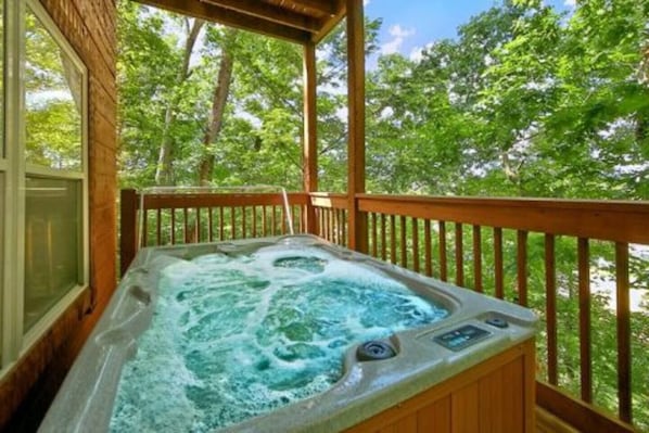 Enjoy relaxing in the hot tub.