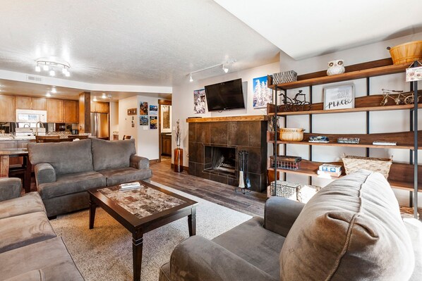 Living Room with Sofa Sleeper and Fireplace