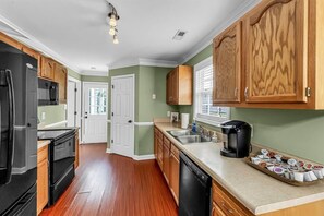 Full Kitchen With All Cooking Utensils