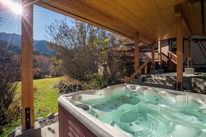 Soak your body in the hot tub and your soul in the surrounding nature.