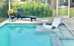New Ledge Lounger chair and cooler side table. Newly installed handrail for pool