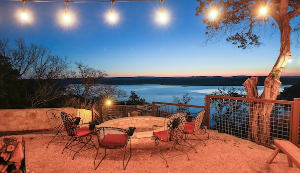 Large outdoor fire pit with incredible Lake Travis and Texas Hill Country views.