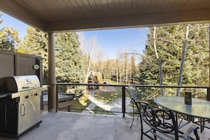 Spacious balcony with beautiful views and a gas grill.