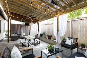 Dreamy Backyard With A TV & Outdoor Fireplace!