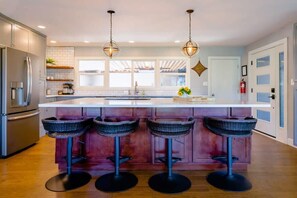 Gather around the huge kitchen island.
