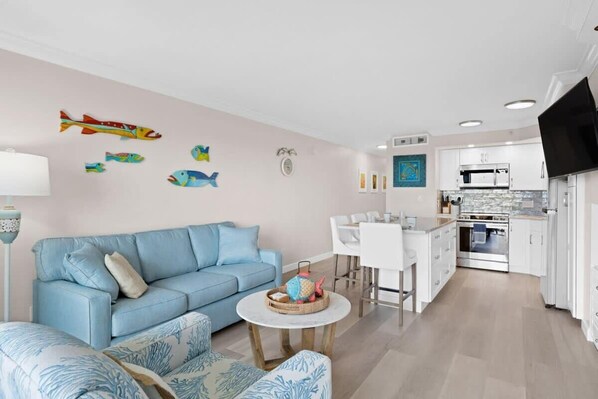 Updated living area with brand new furniture and ample seating