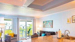 Includes spacious L-Shaped counter and plenty of seating for up to four while you enjoy the wall mounted LED TV or the beautiful sunset 