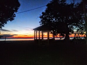 Just the right spot, our gazebo sits where the grass line meets the shoreline.