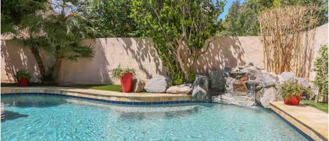 Relax by the private backyard pool