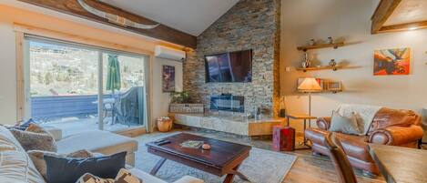 Open, spacious living room with loads of natural light.