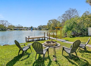 You'll be on a small lake, with a shared backyard overlooking the water.
