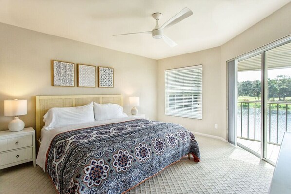 Master Bedroom with king size bed, tv and entrance to lanai