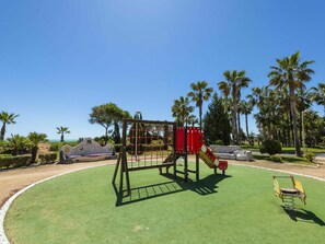 Sky, Plant, Tree, Shade, Land Lot, Grass, Leisure, Outdoor Furniture, Playground, Real Estate
