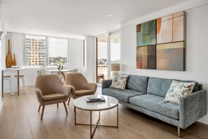 Living room with dining area in the background