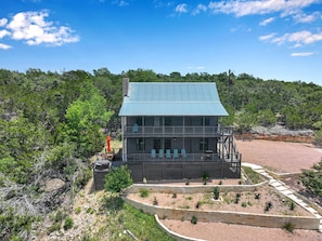 Two story escape with hill country views