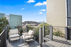 Catch some rays on the shared, outdoor sundeck.