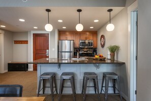 Pull up a seat at the open concept kitchen