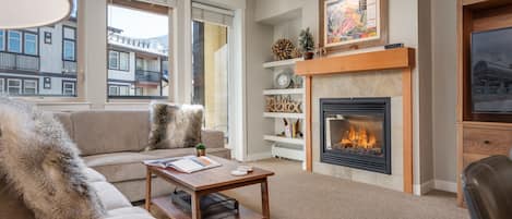 Warm up by the gas fire and access your private deck