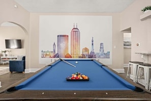 Rack up the balls and break while enjoying this picturesque open concept space