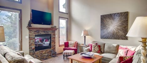 Living room with fireplace and TV!