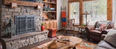 Cozy Great Room featuring gas fireplace, forest views and open floor plan to bring together family and friends after exploring the best of Central Oregon.