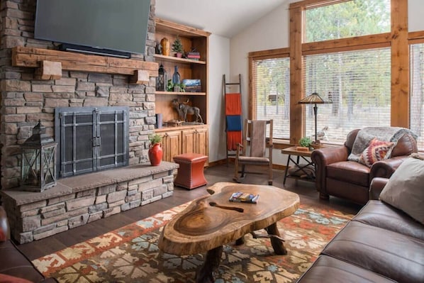 Cozy Great Room featuring gas fireplace, forest views and open floor plan to bring together family and friends after exploring the best of Central Oregon.