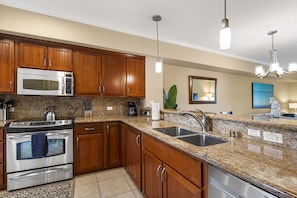 Fully equipped kitchen with stainless steel appliances