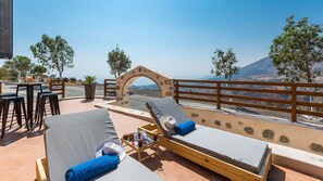 Pool area and tremendous views of the sea.