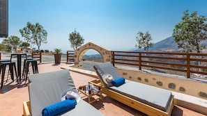 Pool area and tremendous views of the sea.