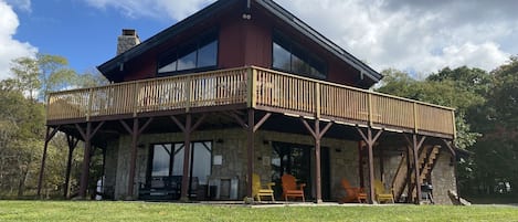 The spacious lodge has a wrap around deck and a lower level patio.