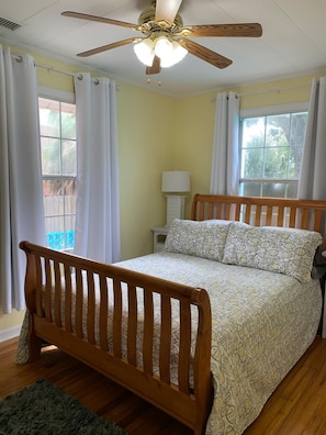 This bright 2nd bedroom, has black out drapes for those who need it pitch dark