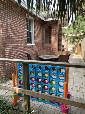 Outside patio space, huge connect 4, bbq grill and seating 