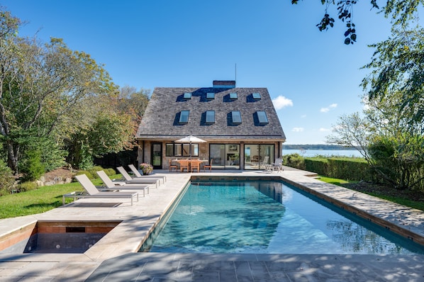 Pool with hot tub facing east