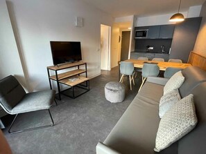 Snuggle up with a cup of coffee or tea on the comfortable sofa.