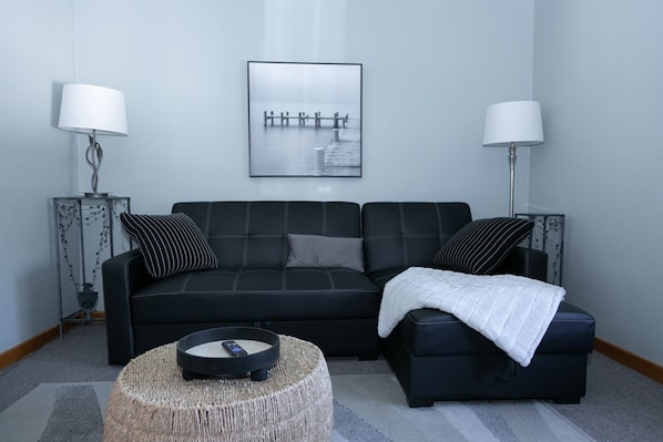 Living room with natural light from windows 