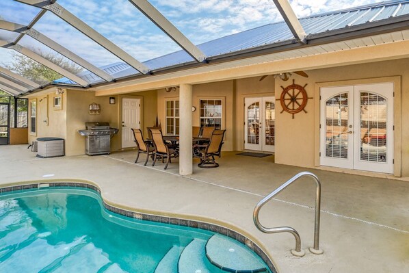 Have a cookout while the kids play in the pool.